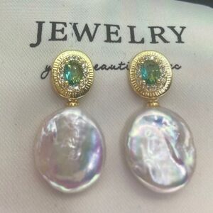 Gold and Silver Earrings with Green Gemstones